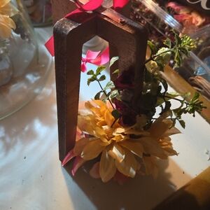 Rustic Wooden Floral Arrangement with Yellow and Pink Accents